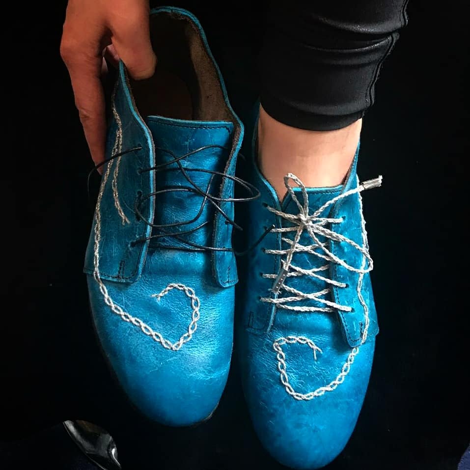Myself modelling the shoes which in this photo have different colored laces. One tis the normal silvery one and the other is black, to show how important the contract for the lace is. Due to their shape the shoes can be worn with skirt, dresses and pants, but in a more casual way