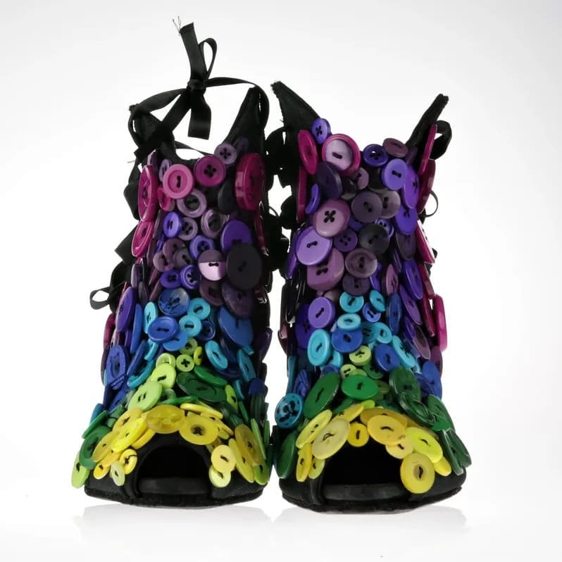 Front view of the shoes to showcase the wildness of buttons in various wonderful shapes and colors