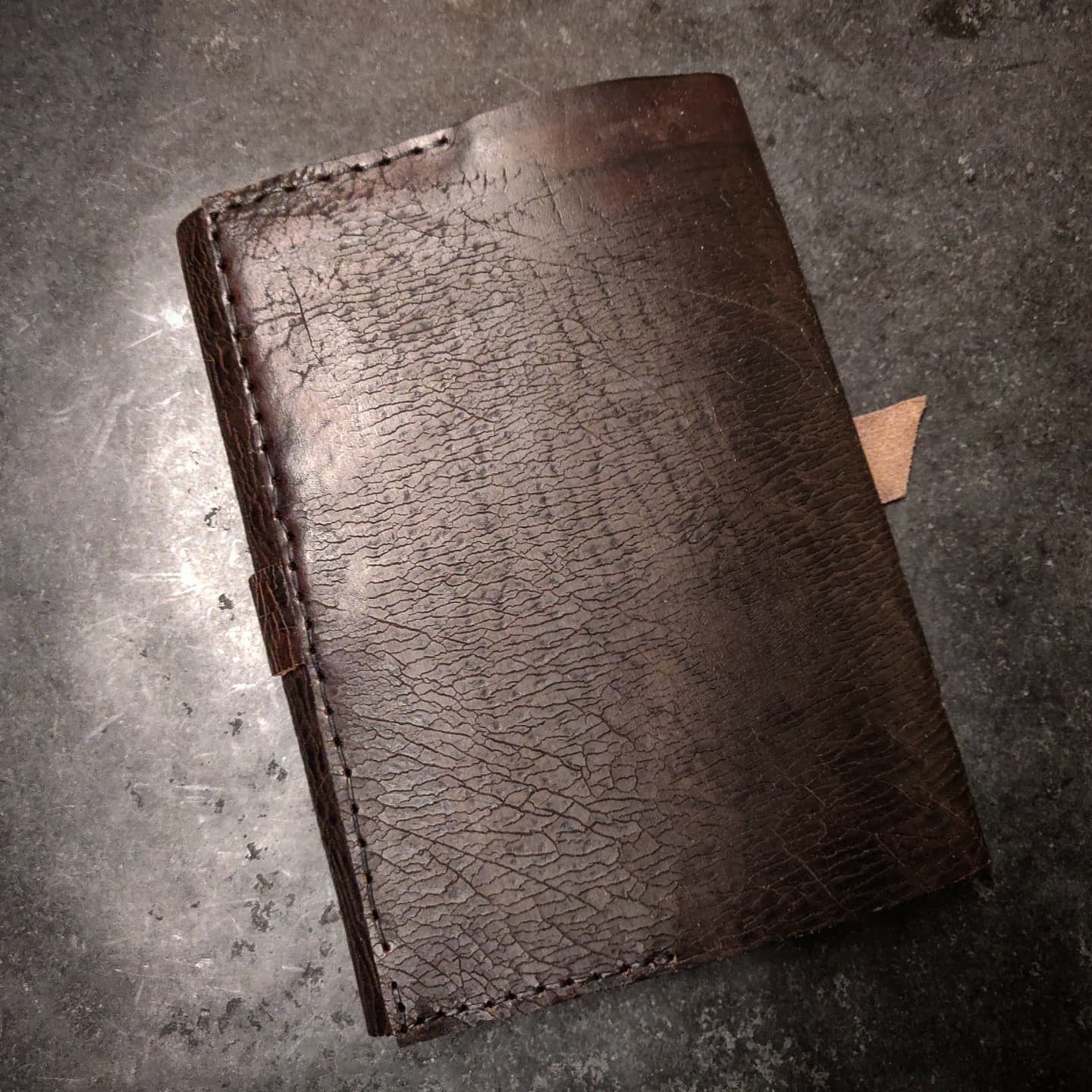 Back side of journal and detailed hand stitch 